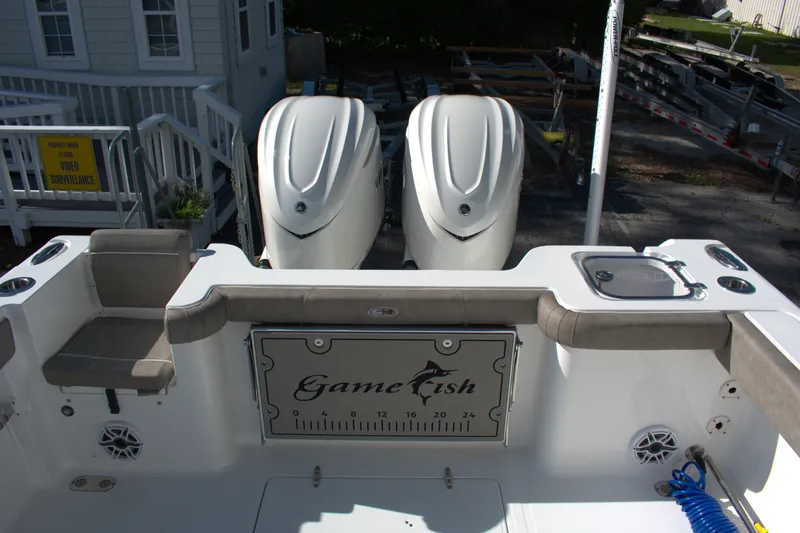 Slide: The Image of 2026 Sea Hunt Gamefish 30CB boat with dual engines and fishing features. - 9