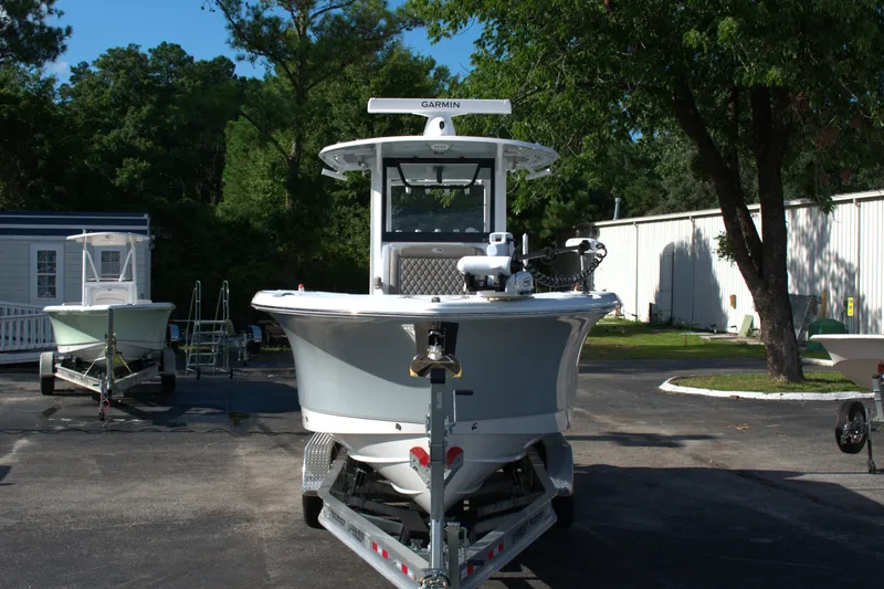 Slide: The Image of 2026 Sea Hunt Gamefish 30CB boat on trailer in outdoor setting. - 1