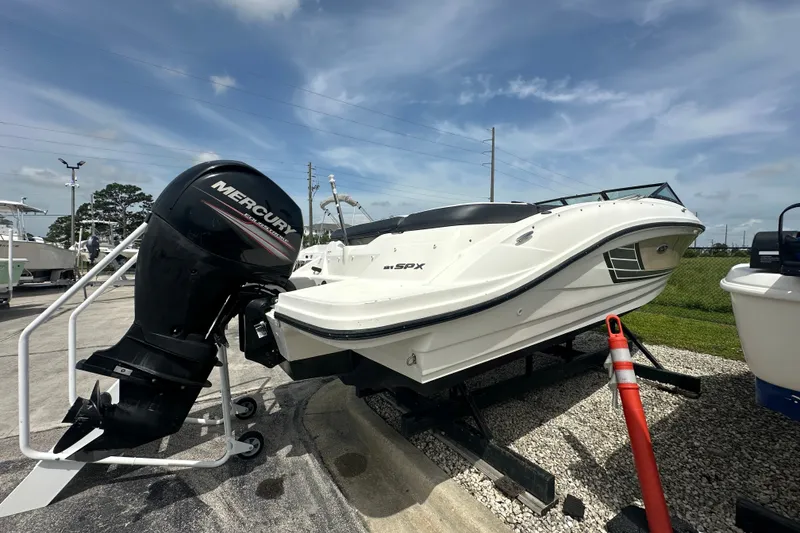 Slide: The Image of 2015 Sea Ray 21 SPX OB boat with Mercury outboard engine on display. - 3