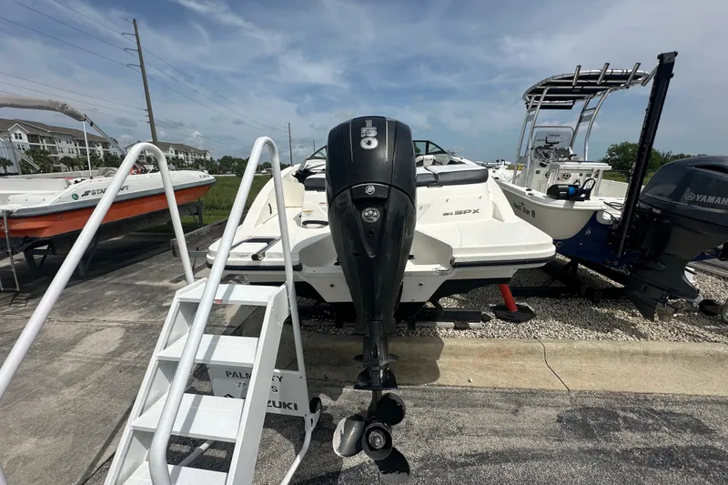 Slide: The Image of 2015 Sea Ray 21 SPX OB boat with outboard motor on display. - 4