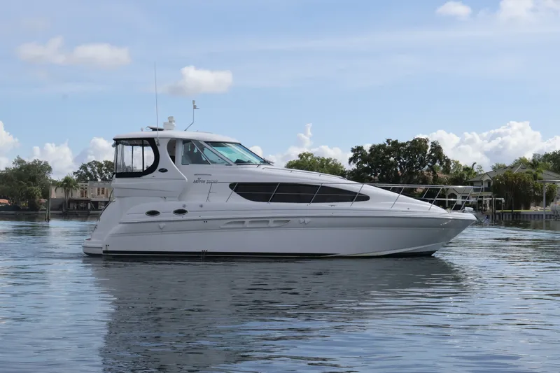 Slide: The Image of 2006 Sea Ray 40 Motor Yacht on calm water, side view. - 3