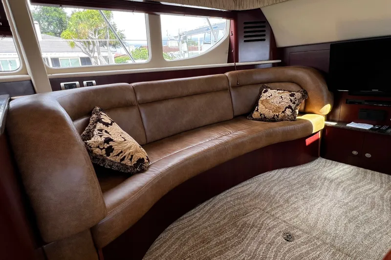 Slide: The Image of Luxurious interior of 2006 Sea Ray 40 Motor Yacht with plush seating and elegant decor. - 36