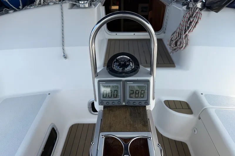 Slide: The Image of Cockpit of 1992 Hunter Legend 43 sailboat with navigation instruments and compass. - 15