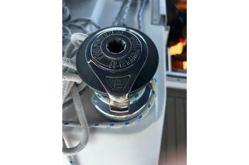 Slide: The Image of Winch on 1992 Hunter Legend 43 sailboat with coiled rope. - 23