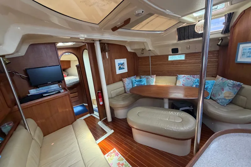 Slide: The Image of Interior of 1992 Hunter Legend 43 yacht with cozy seating and wooden finishes. - 34