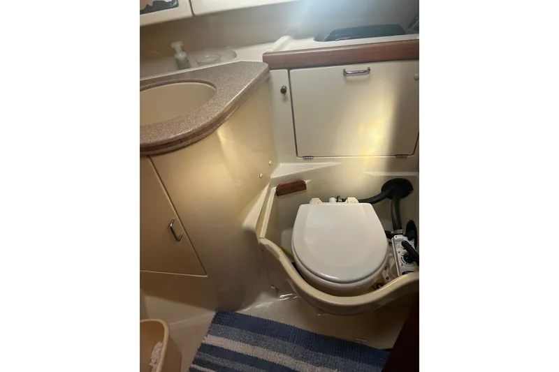 Slide: The Image of Bathroom interior of 1992 Hunter Legend 43 yacht, featuring toilet and sink. - 28