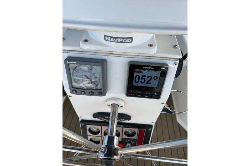Slide: The Image of Hunter Legend 43 yacht cockpit instruments, featuring Raymarine displays, 1992 model. - 16