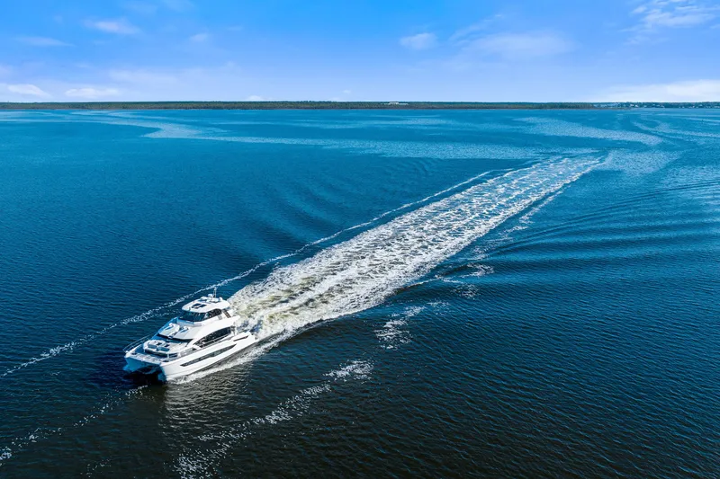 Slide: The Image of Aquila 54 Yacht cruising on open water, 2021 model. - 57