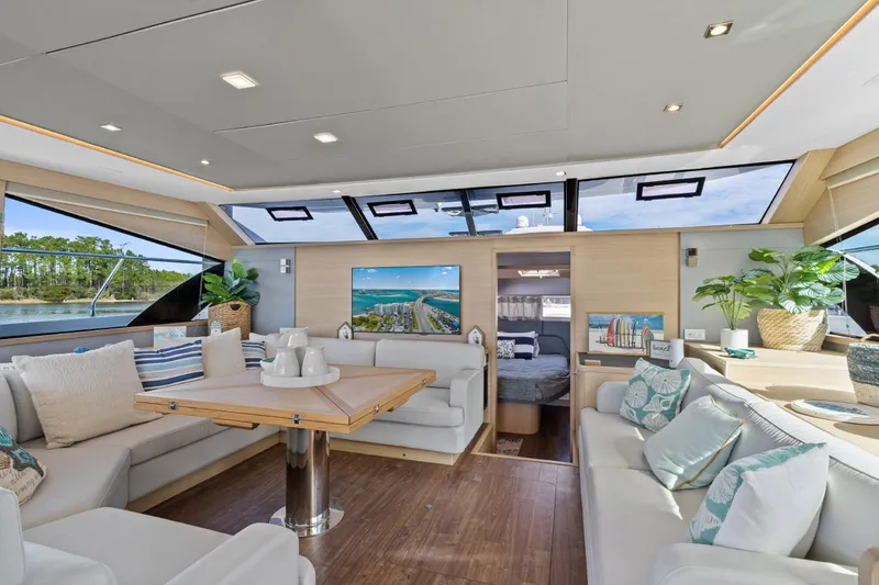 Slide: The Image of Luxurious interior of 2021 Aquila 54 Yacht with elegant seating and modern decor. - 14