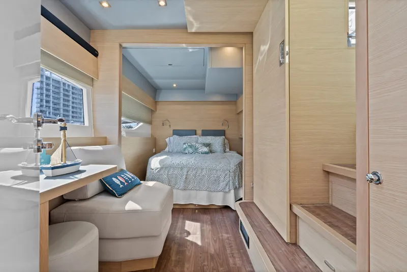 Slide: The Image of Luxurious interior of 2021 Aquila 54 Yacht featuring a cozy bedroom and elegant decor. - 23