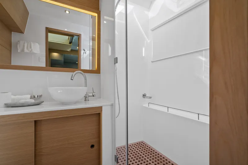 Slide: The Image of Luxurious bathroom interior of 2021 Aquila 54 Yacht with modern fixtures and elegant design. - 26