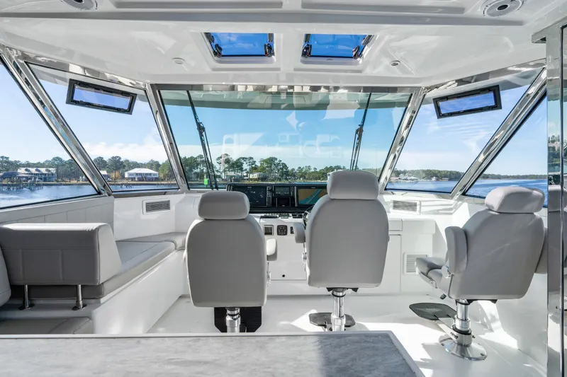 Slide: The Image of Interior view of 2021 Aquila 54 Yacht cockpit with modern seating and panoramic windows. - 41