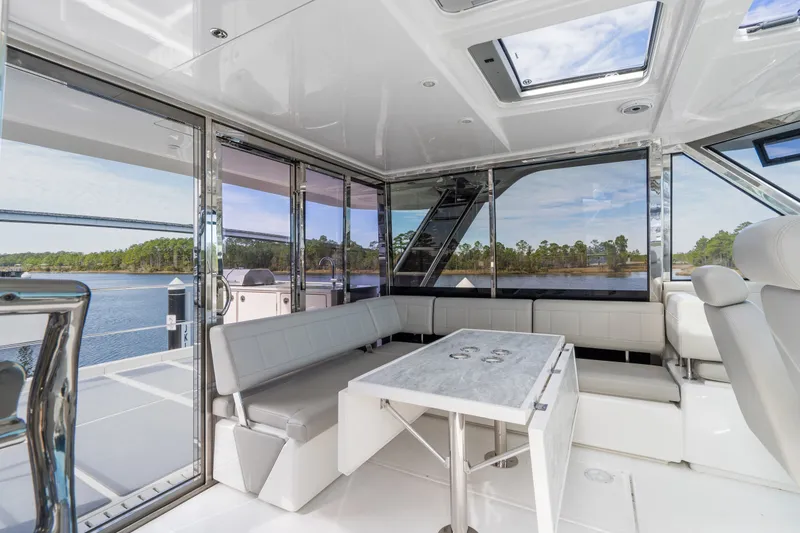 Slide: The Image of Luxurious interior of 2021 Aquila 54 Yacht with scenic water views. - 45