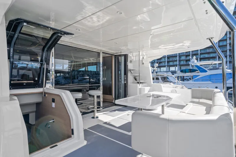 Slide: The Image of Luxurious 2021 Aquila 54 Yacht interior with sleek seating and modern design. - 51