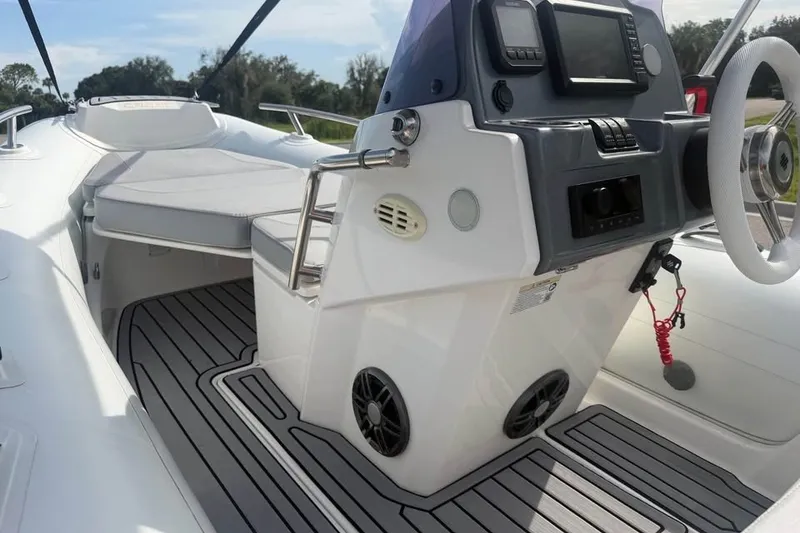 Slide: The Image of Interior of 2023 Grand G420 boat with modern dashboard and seating. - 10