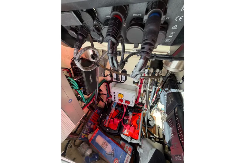 Slide: The Image of Electrical system inside a 2018 Yellowfin 21 Bay boat, showcasing wiring and components. - 45