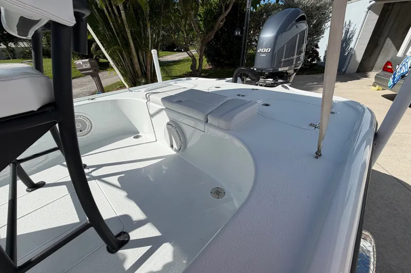 Slide: The Image of 2018 Yellowfin 21 Bay boat deck with seating and Yamaha 200 engine. - 17