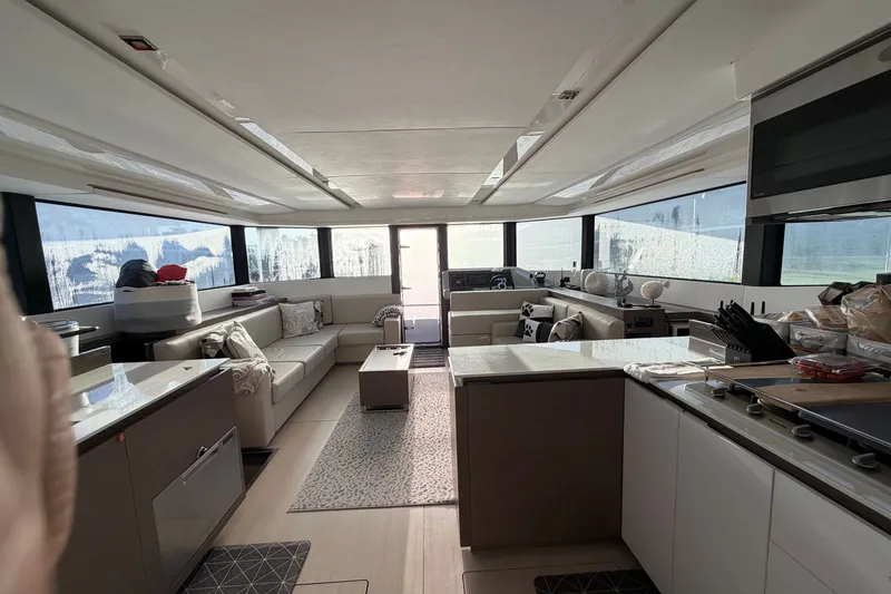 Slide: The Image of Luxurious interior of 2025 Leopard 53 Powercat yacht with modern furnishings and panoramic windows. - 7