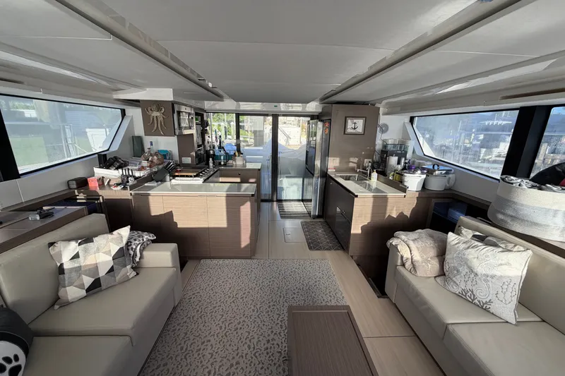 Slide: The Image of Interior of 2025 Leopard 53 Powercat yacht with modern kitchen and seating area. - 6