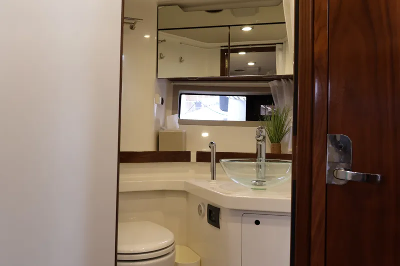 Slide: The Image of Luxurious bathroom interior of 2024 Aquador 300 HT yacht with modern fixtures. - 51