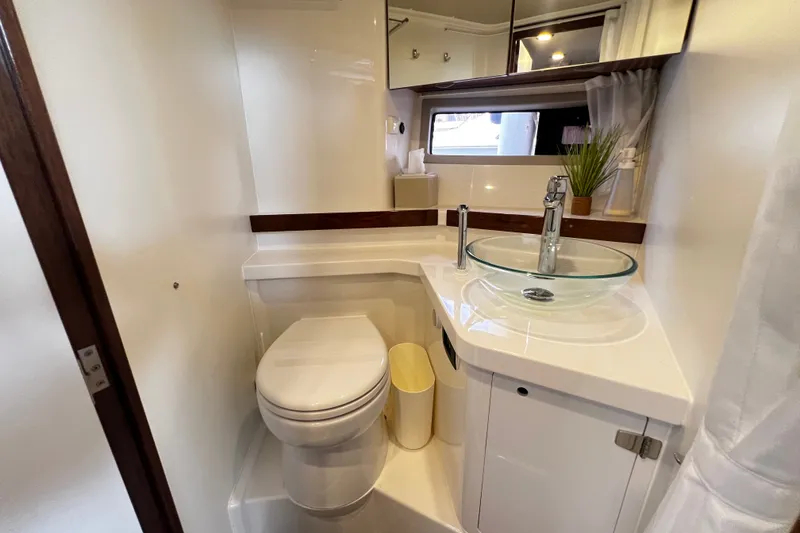 Slide: The Image of Luxurious bathroom in 2024 Aquador 300 HT yacht with modern fixtures and elegant design. - 54