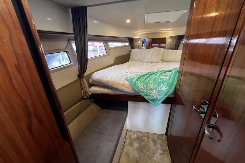 Slide: The Image of Luxurious cabin interior of 2024 Aquador 300 HT yacht with cozy bedding. - 46
