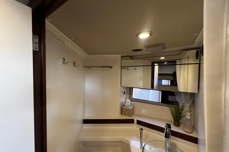 Slide: The Image of Luxurious bathroom interior of 2024 Aquador 300 HT yacht with modern fixtures. - 55