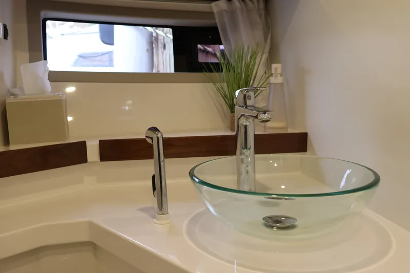 Slide: The Image of Modern bathroom sink with glass basin in 2024 Aquador 300 HT yacht. - 53