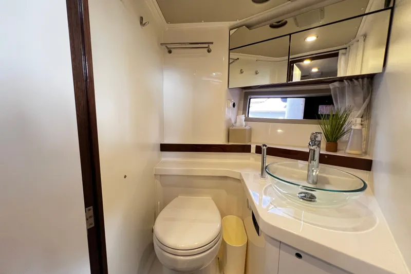 Slide: The Image of Modern bathroom in 2024 Aquador 300 HT yacht with glass sink and toilet. - 52