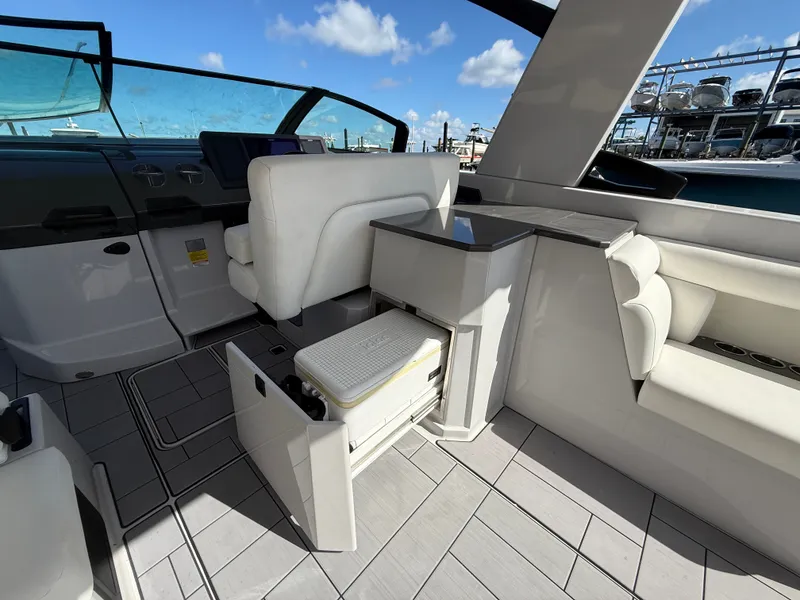 Slide: The Image of The image shows the cockpit of a 2023 Aviara AV36 OB with luxurious white seating. - 18