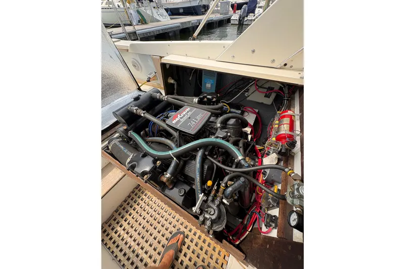 Slide: The Image of Engine compartment of a 1974 Bertram 31 Flybridge Cruiser with MerCruiser engine. - 34