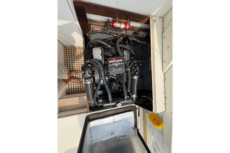 Slide: The Image of Engine compartment of a 1974 Bertram 31 Flybridge Cruiser with MerCruiser 7.4L engine. - 39
