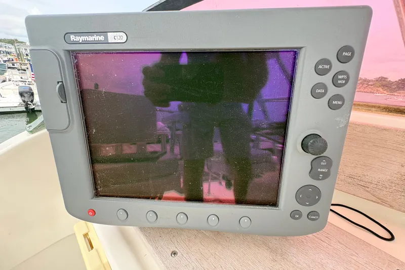 Slide: The Image of Raymarine C120 display on a 1974 Bertram 31 Flybridge Cruiser boat. - 26