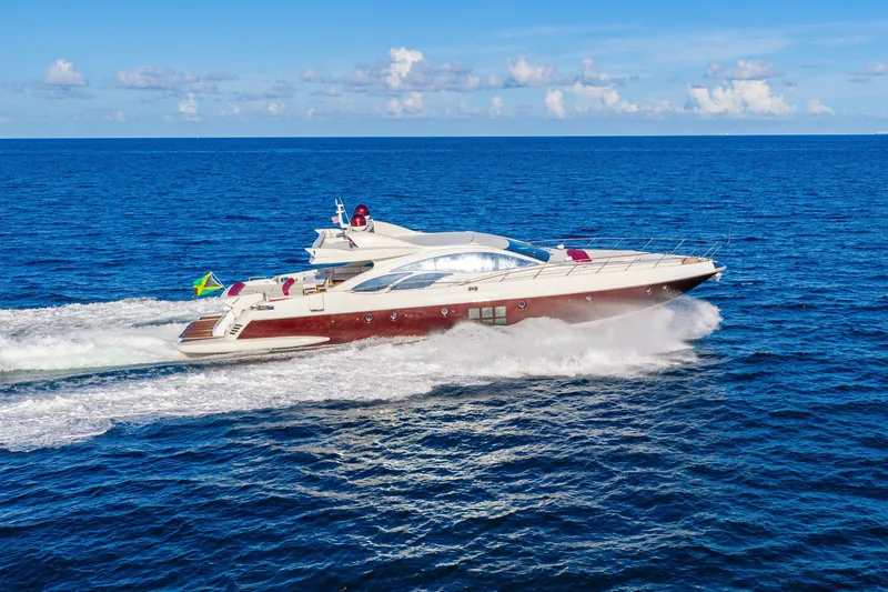Slide: The Image of Luxury 2009 Azimut 86S yacht cruising on open blue sea. - 36