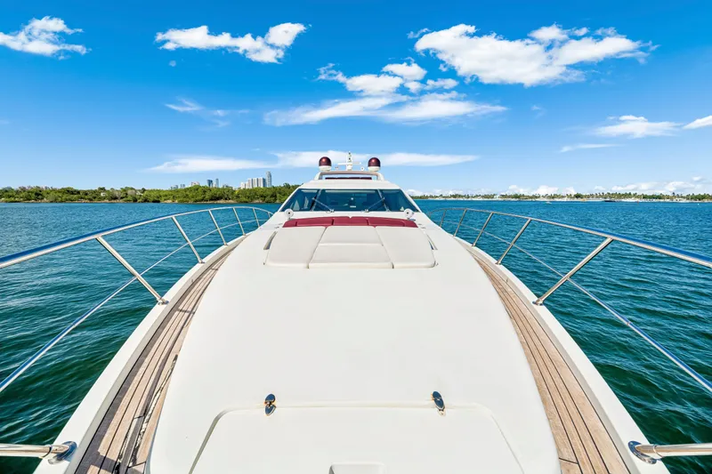 Slide: The Image of 2009 Azimut 86S yacht cruising on a sunny day with clear blue skies. - 65