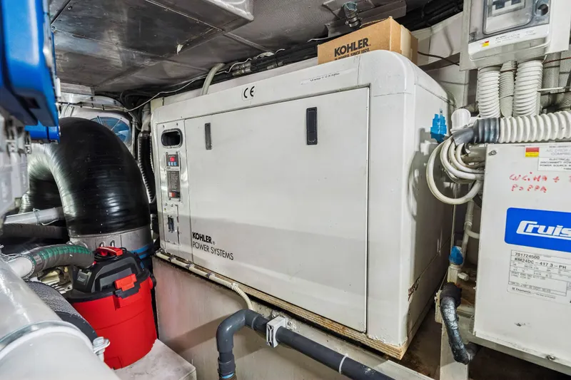Slide: The Image of Engine room of 2009 Azimut 86S yacht featuring Kohler power systems. - 121