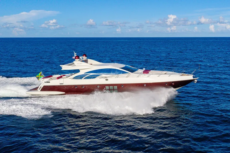 Slide: The Image of 2009 Azimut 86S yacht cruising on open ocean under clear blue sky. - 42