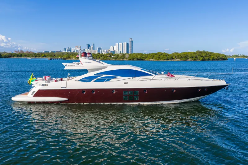 Slide: The Image of Luxury 2009 Azimut 86S yacht cruising near city skyline on a sunny day. - 26