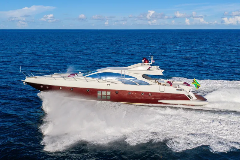 Slide: The Image of Luxurious 2009 Azimut 86S yacht cruising on open sea under clear skies. - 38