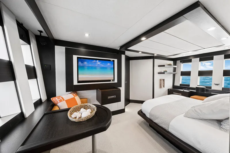 Slide: The Image of Luxurious 2009 Azimut 86S yacht bedroom with modern decor and ocean view windows. - 96