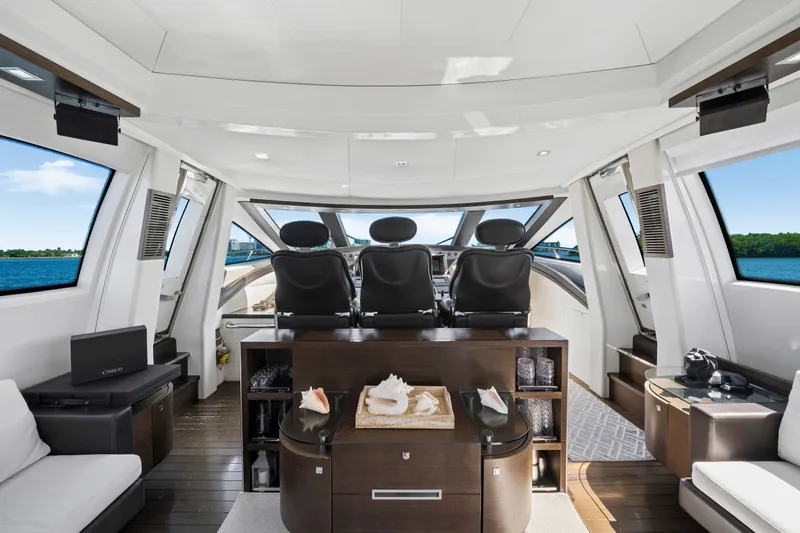 Slide: The Image of Luxurious interior of 2009 Azimut 86S yacht with modern helm and panoramic windows. - 78