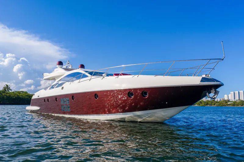 Slide: The Image of 2009 Azimut 86S yacht on water under clear blue sky. - 28