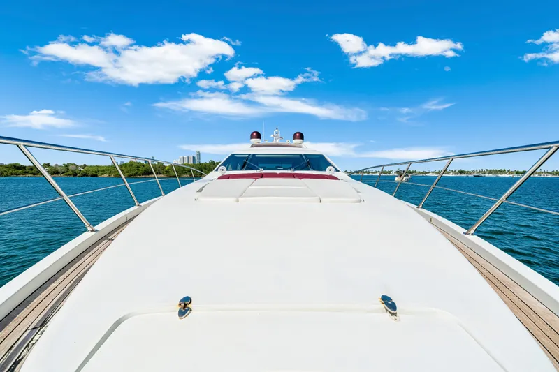 Slide: The Image of 2009 Azimut 86S yacht cruising on a sunny day with clear blue skies. - 66