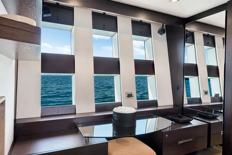 Slide: The Image of Luxurious interior of 2009 Azimut 86S yacht with ocean view through modern windows. - 92
