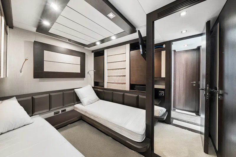 Slide: The Image of Luxurious interior cabin of a 2009 Azimut 86S yacht with modern design elements. - 110
