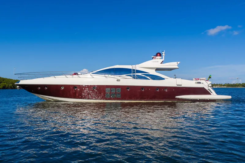 Slide: The Image of Luxurious 2009 Azimut 86S yacht cruising on clear blue waters. - 18