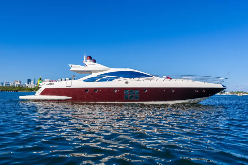 Slide: The Image of Luxurious 2009 Azimut 86S yacht cruising on clear blue waters. - 27