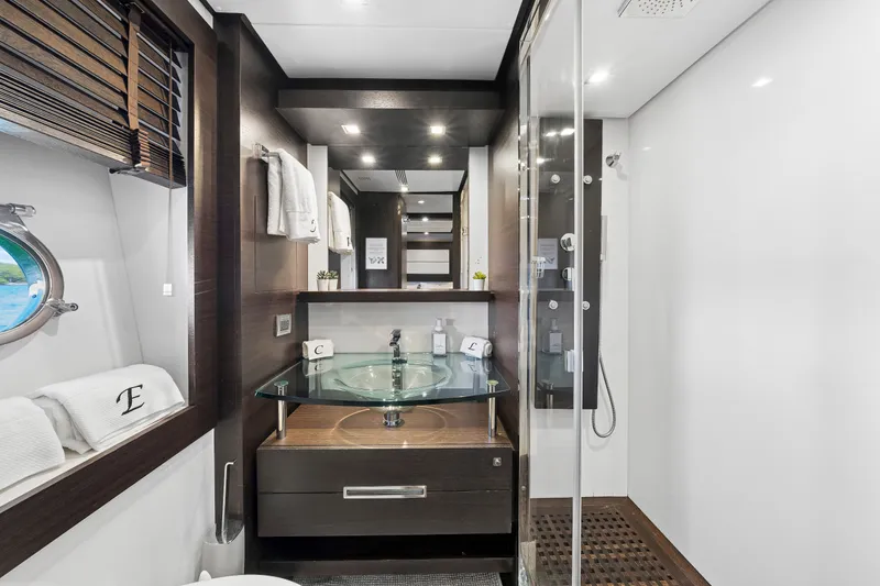 Slide: The Image of Luxurious bathroom interior of 2009 Azimut 86S yacht with modern glass sink and shower. - 111