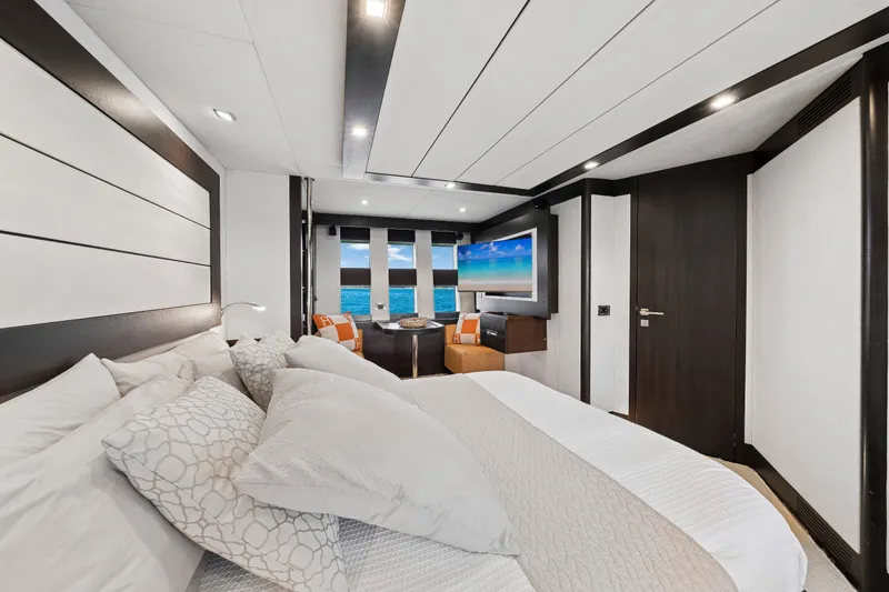 Slide: The Image of Luxurious bedroom interior of 2009 Azimut 86S yacht with ocean view and modern decor. - 93