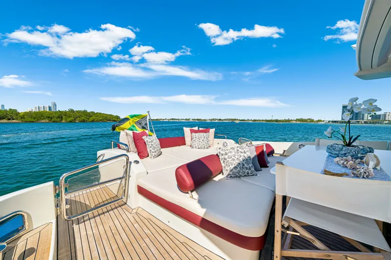 Slide: The Image of Luxurious 2009 Azimut 86S yacht deck with plush seating and scenic ocean view. - 50